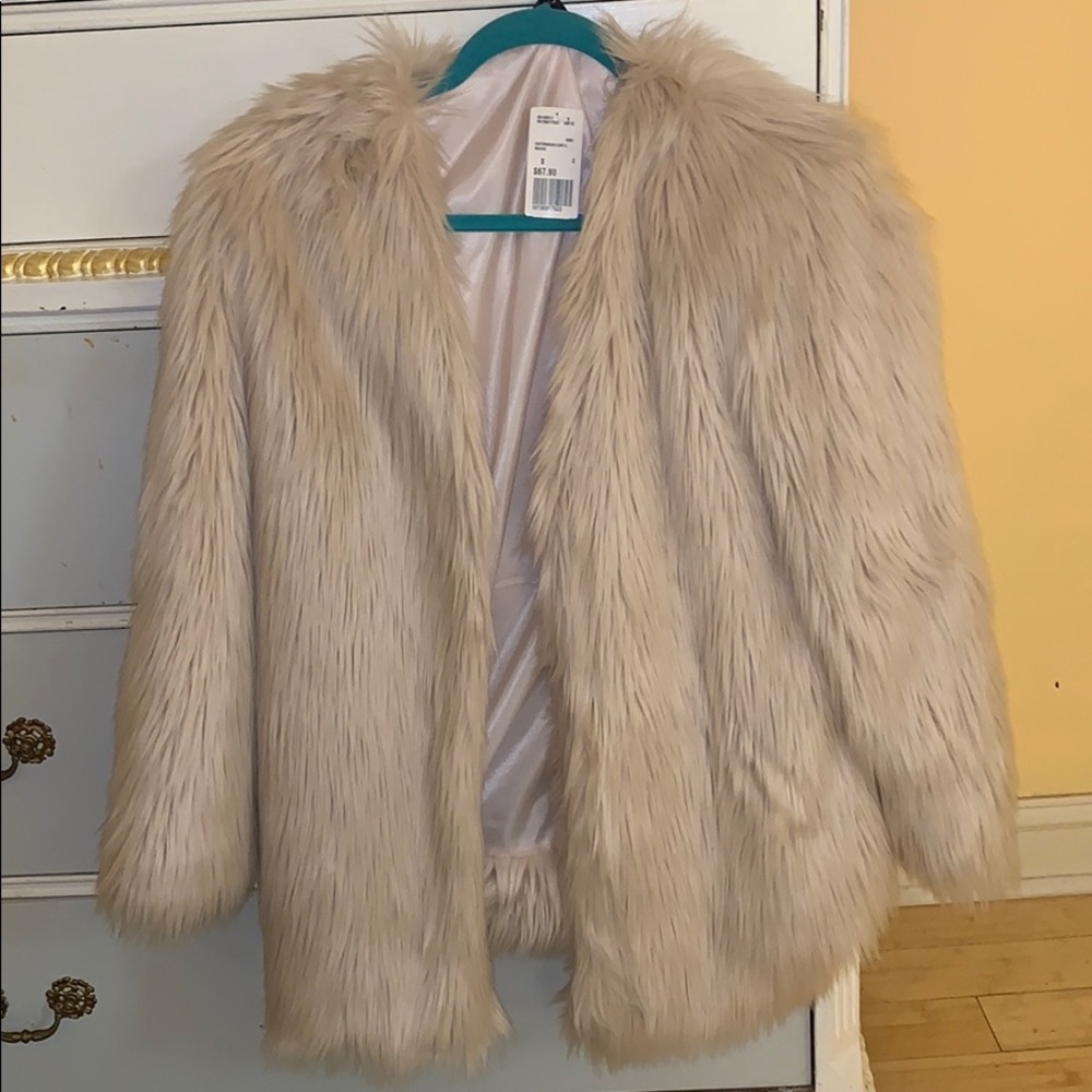 Faux fur coat size small, never worn.